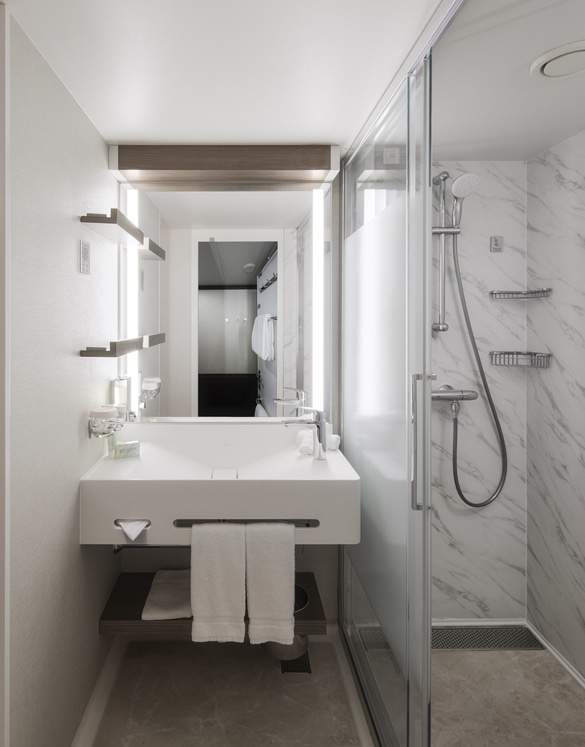 NCL Norwegian Pearl Aft-Facing Club Balcony Suite 2.jpeg